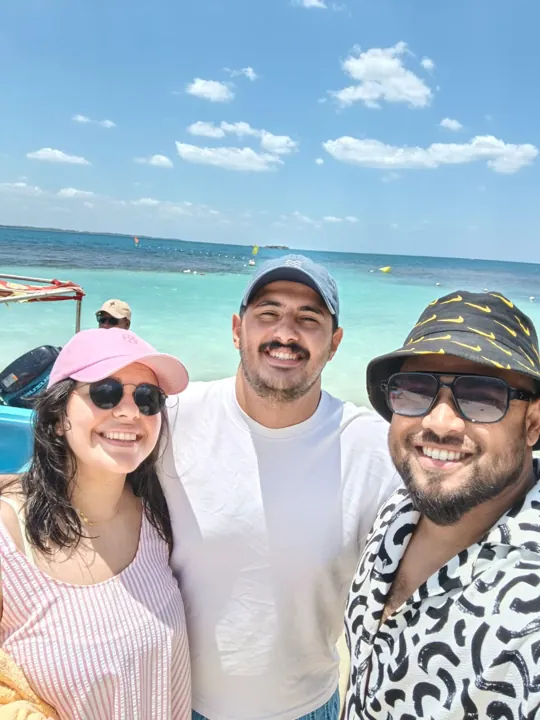 Travellers together by the coast