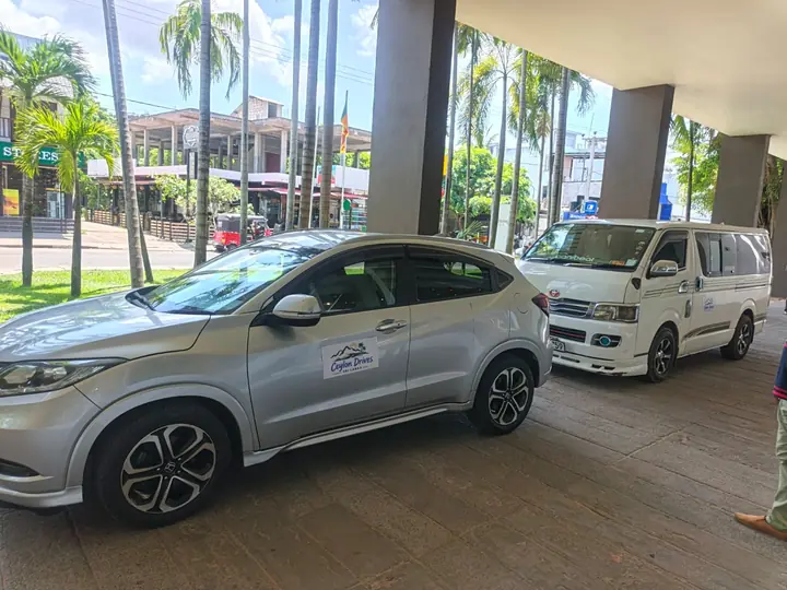 Ceylon Drives car and van with the Ceylon Drives logo, parked together