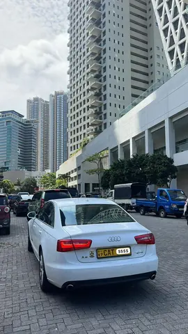 Audi A6 — white car, rear and side