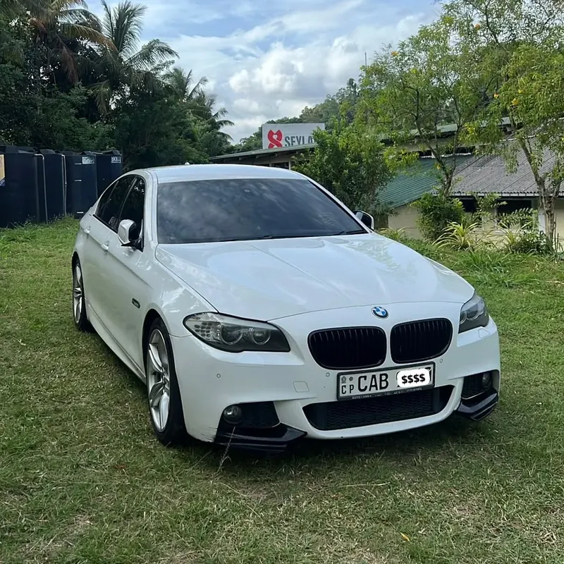 BMW 530 — white car, front and side outdoors