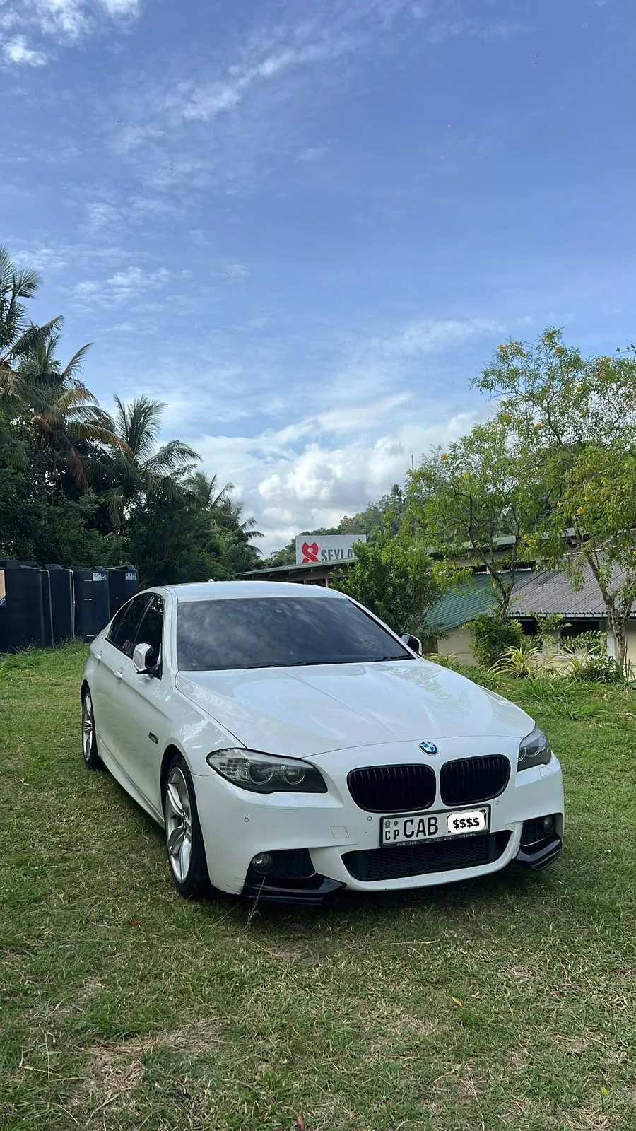 BMW 530 — white car, front and side outdoors