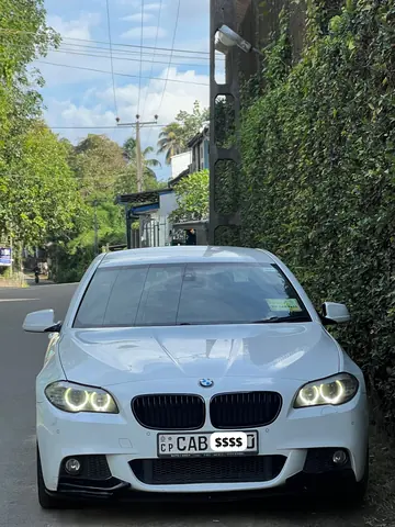 BMW 530 — white car, front