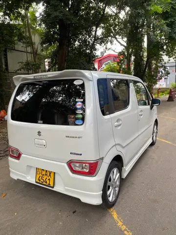 Suzuki Wagon R — white car, rear and side