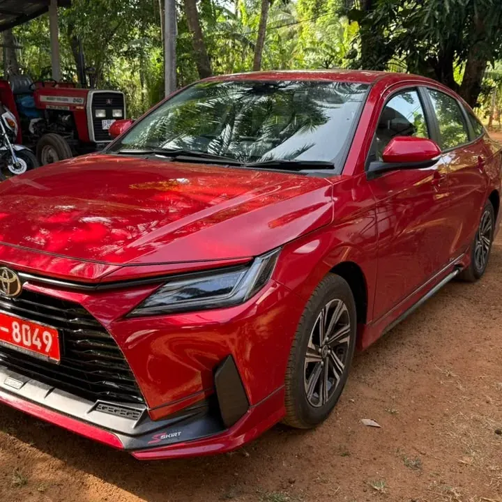 Toyota Ativ — red car, front and side