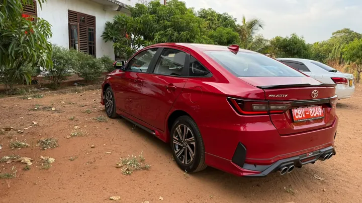 Toyota Ativ — red car, rear and side