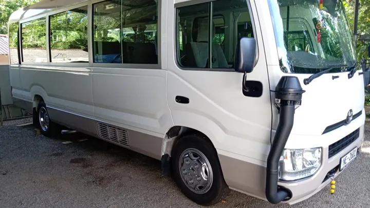 Toyota Coaster — side of the minibus