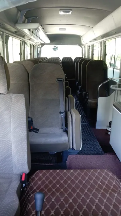 Toyota Coaster — passenger cabin from the rear