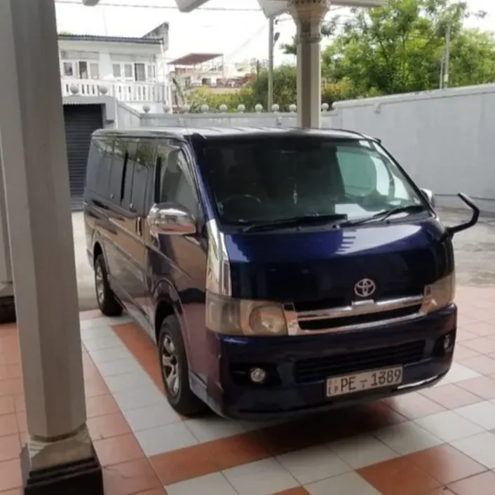 Toyota KDH Flat Roof — blue van, front and side
