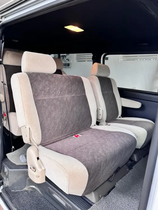 Toyota KDH (white flat roof) — passenger seating