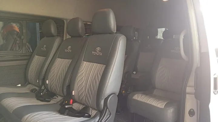 Toyota KDH (white high roof) — passenger seating